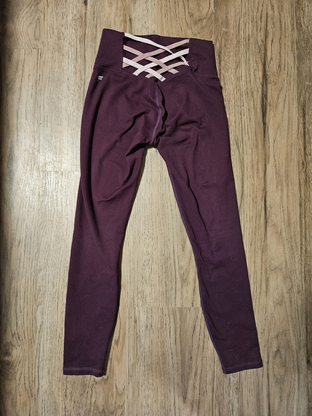 Fabletics Plum Leggings with Pink Crisscross Back